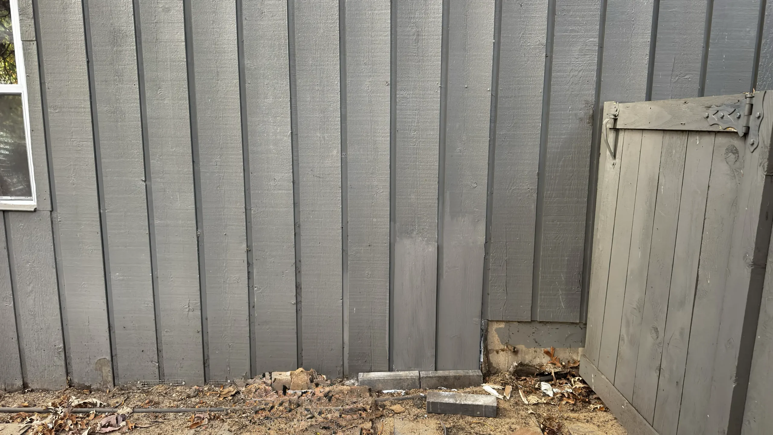 Restored red cedar siding with custom-replicated original wood profile on a home in Winnetka, IL.