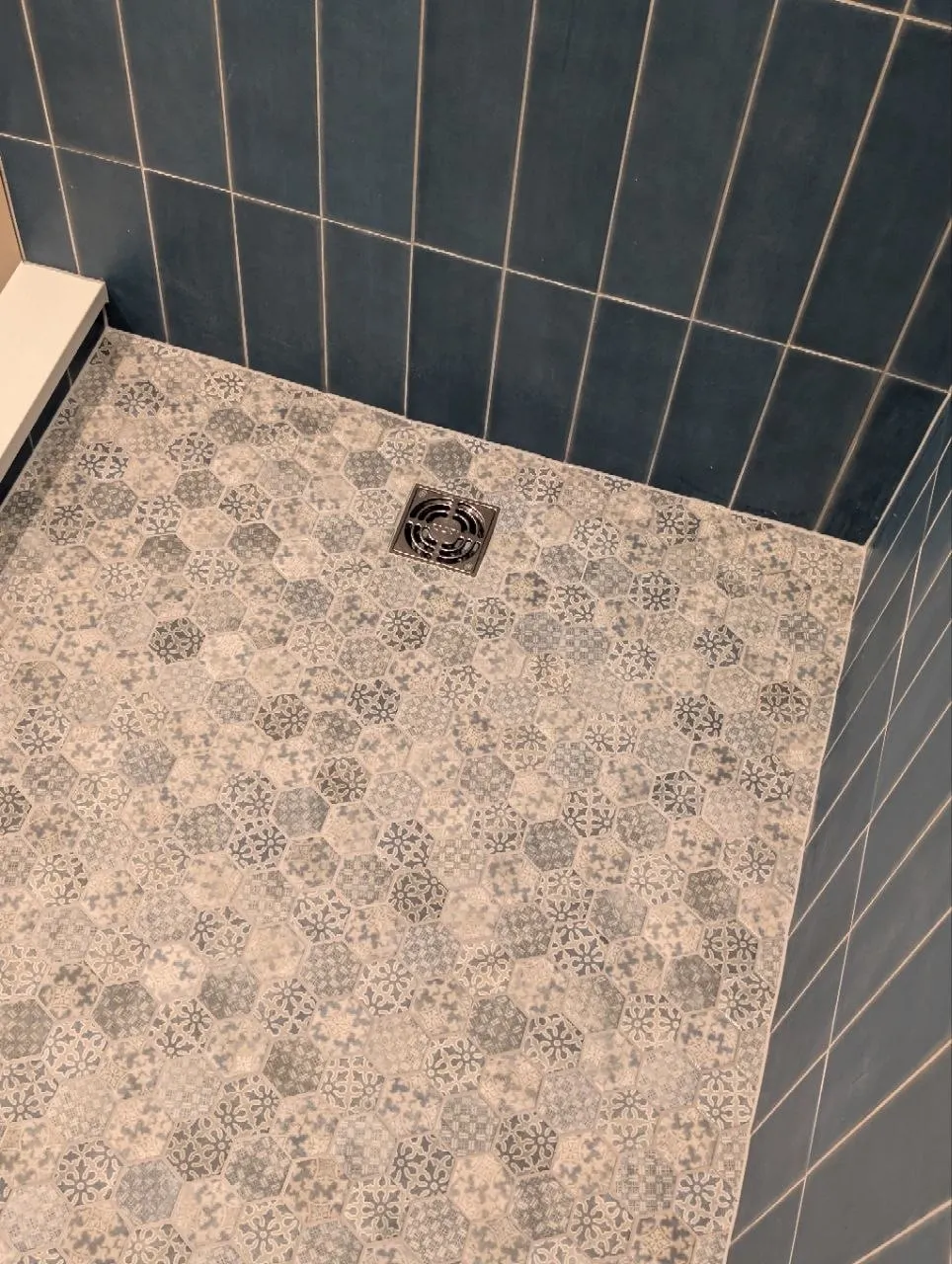 Hexagon mosaic shower floor around square drain with porcelain wall tile, Highland Park IL