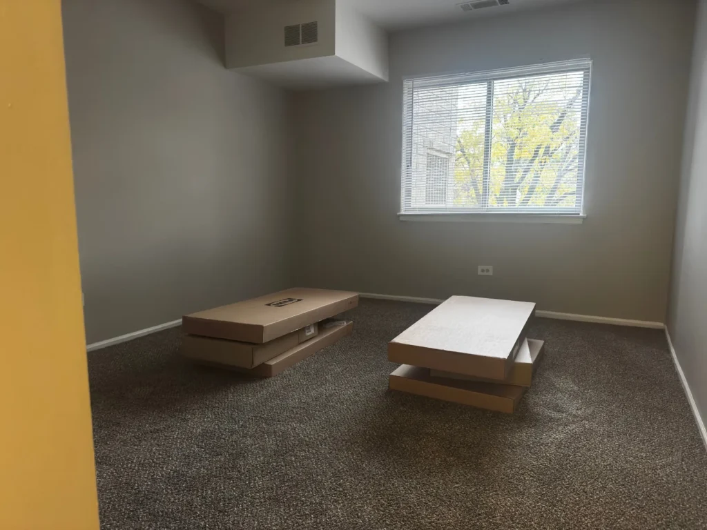 Unopened IKEA bedroom furniture boxes before assembly in Arlington Heights, IL