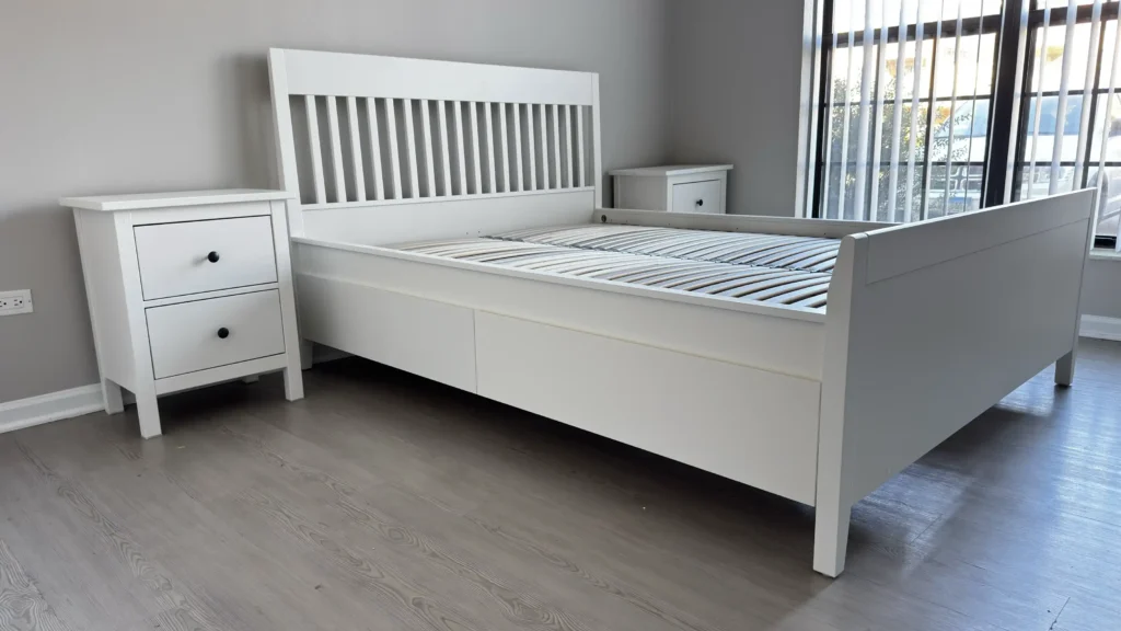 Completed white IKEA IDANÄS bed with LÖNSET slats and matching HEMNES nightstands in Palatine, IL