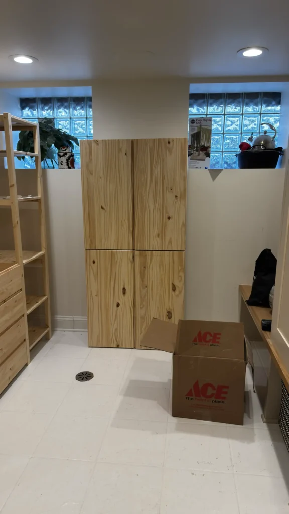 IKEA IVAR pine cabinet components and storage area during assembly in Wilmette, IL