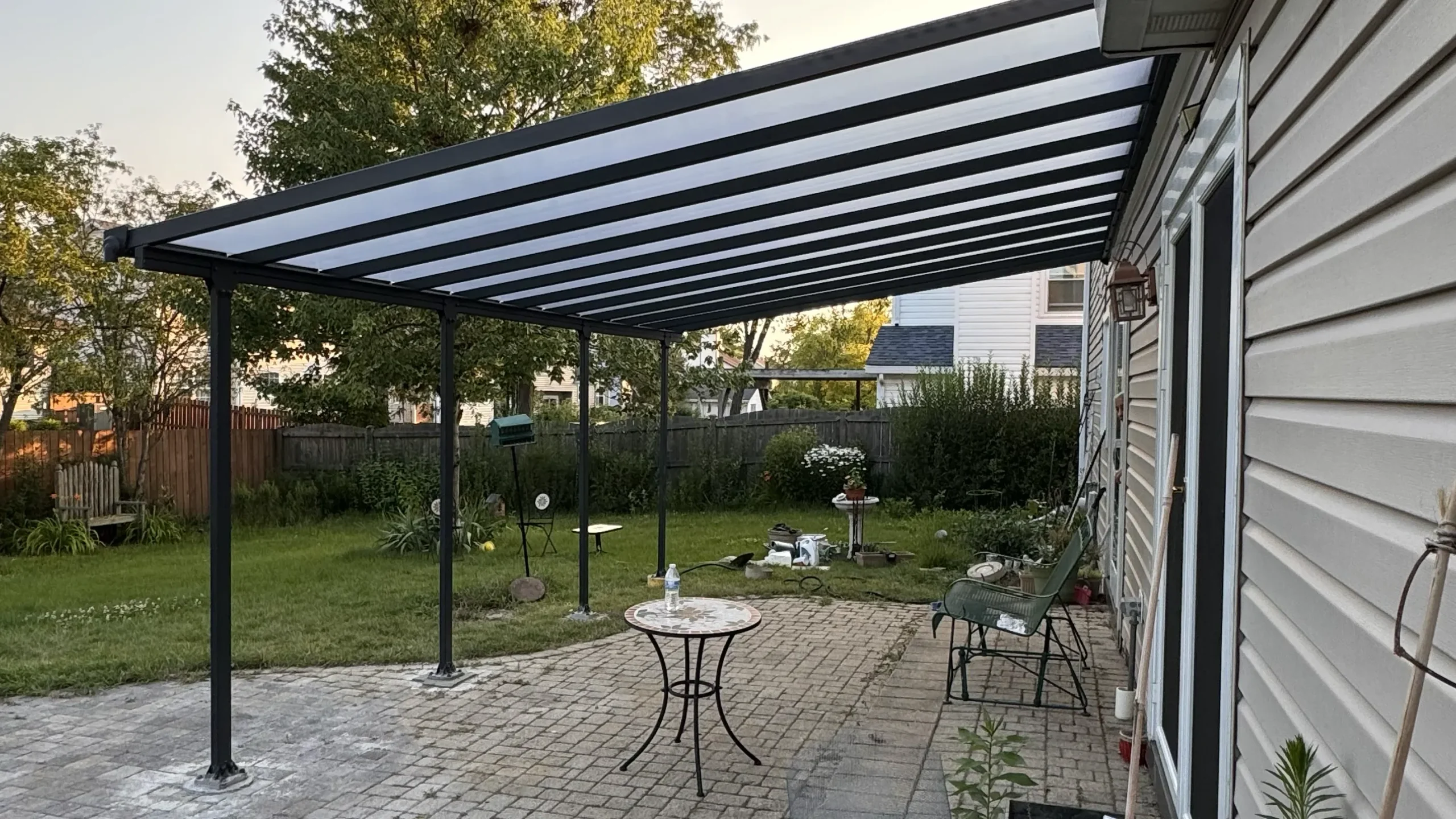 Explore our 10×20 pergola installation in Hoffman Estates, IL, featuring four concrete footings extending to frost depth and a finished backyard patio space.