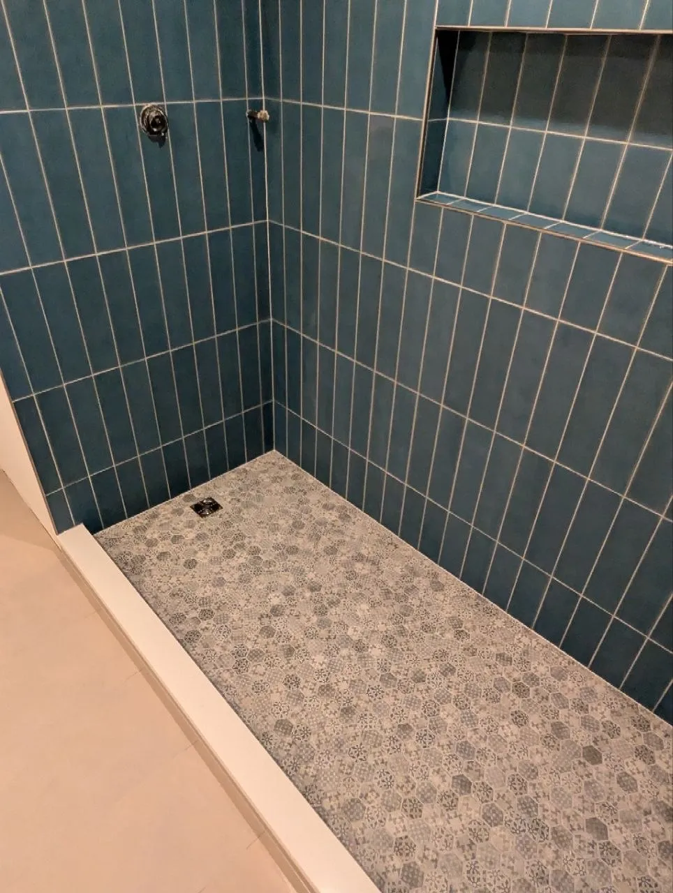 Schluter shower pan with white curb and mosaic floor, Highland Park IL