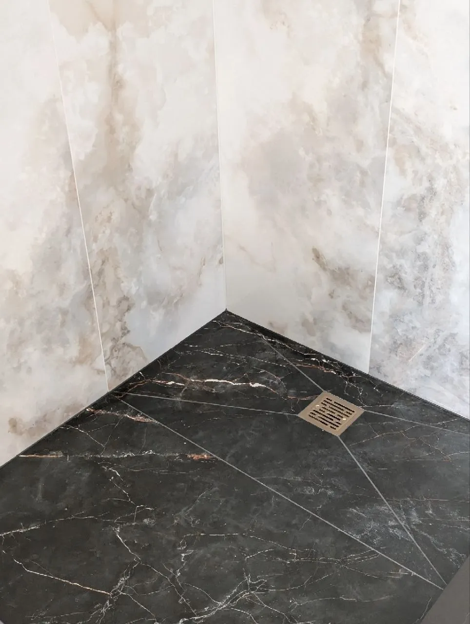 Shower floor tile with slope cuts to square drain, Naperville IL