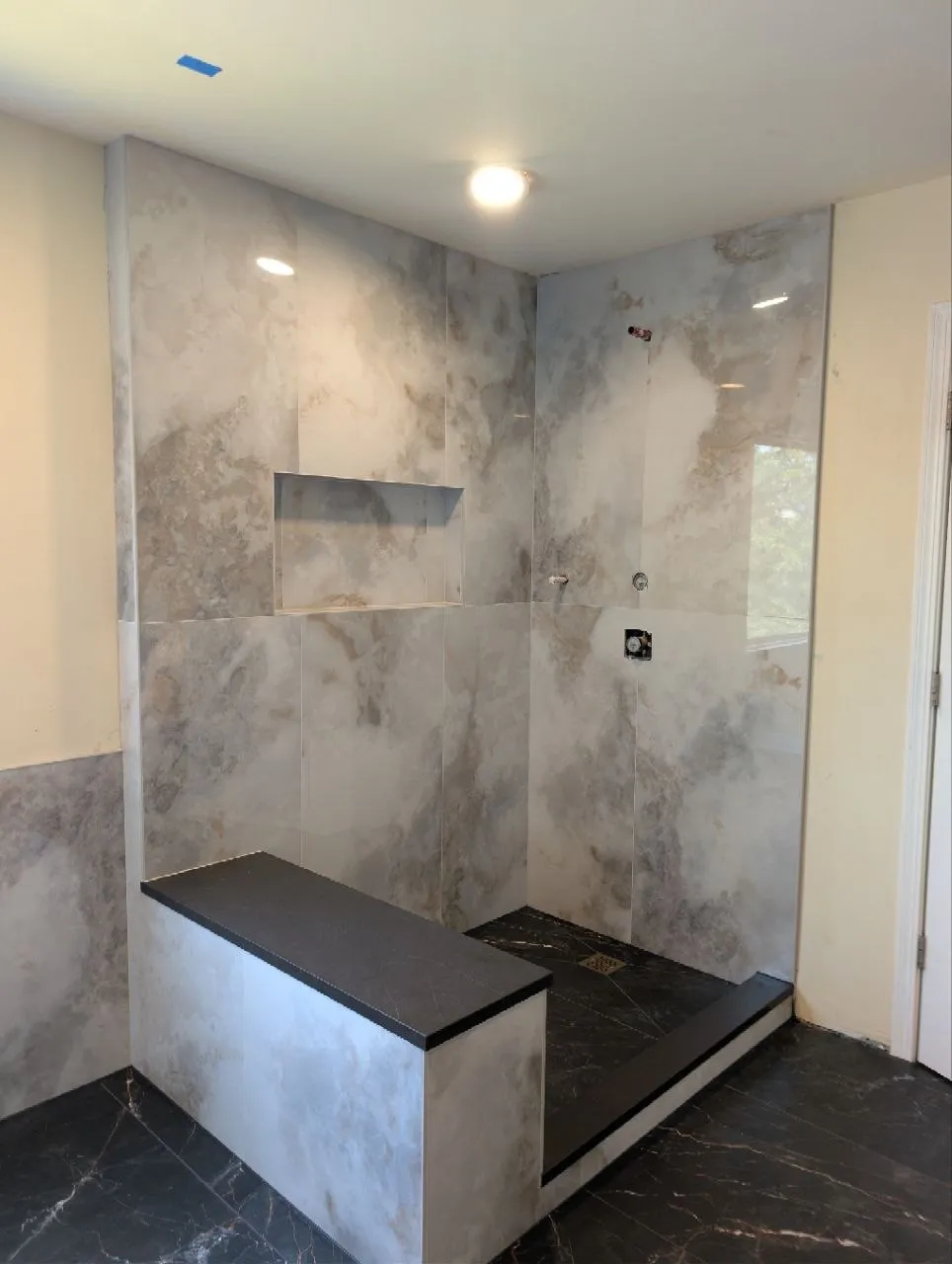 Shower with 24x48 porcelain tile in vertical stack bond, Naperville IL