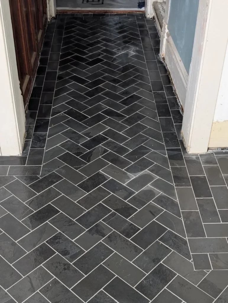 Slate herringbone hallway floor with border leading from kitchen, Barrington IL