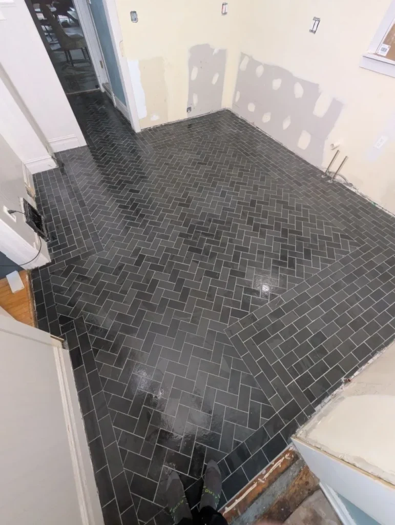 Natural slate herringbone kitchen floor with contrasting border, Barrington IL